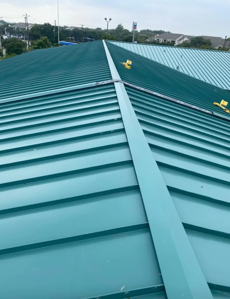Green commercial metal roof ridge and valley for Metal Roof Repair in Blendon